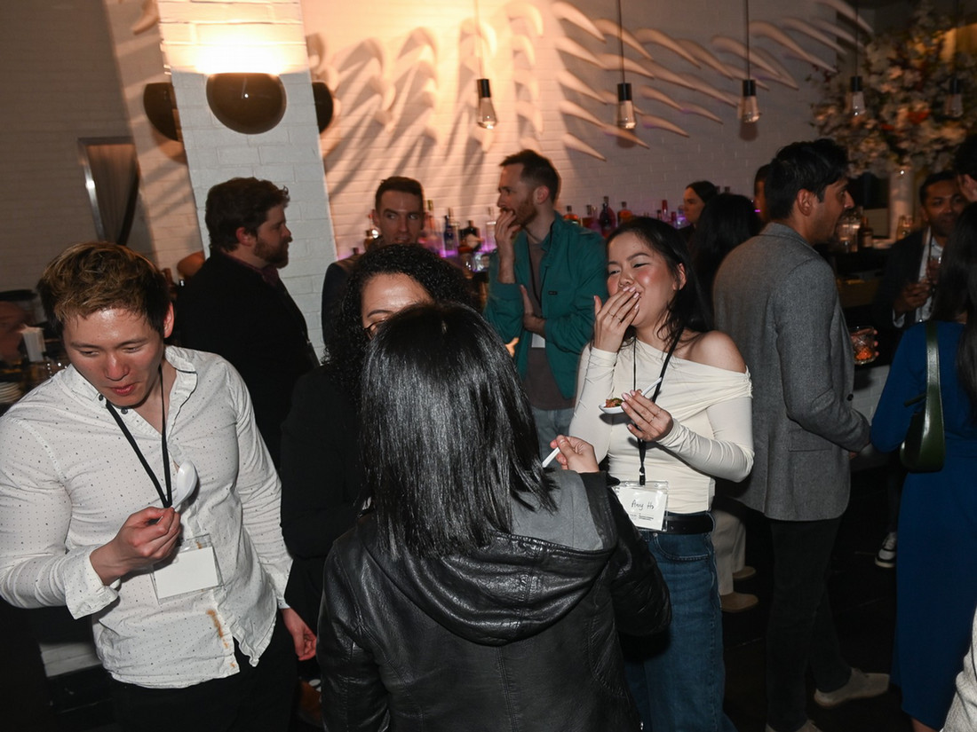 people laughing and enjoying a party